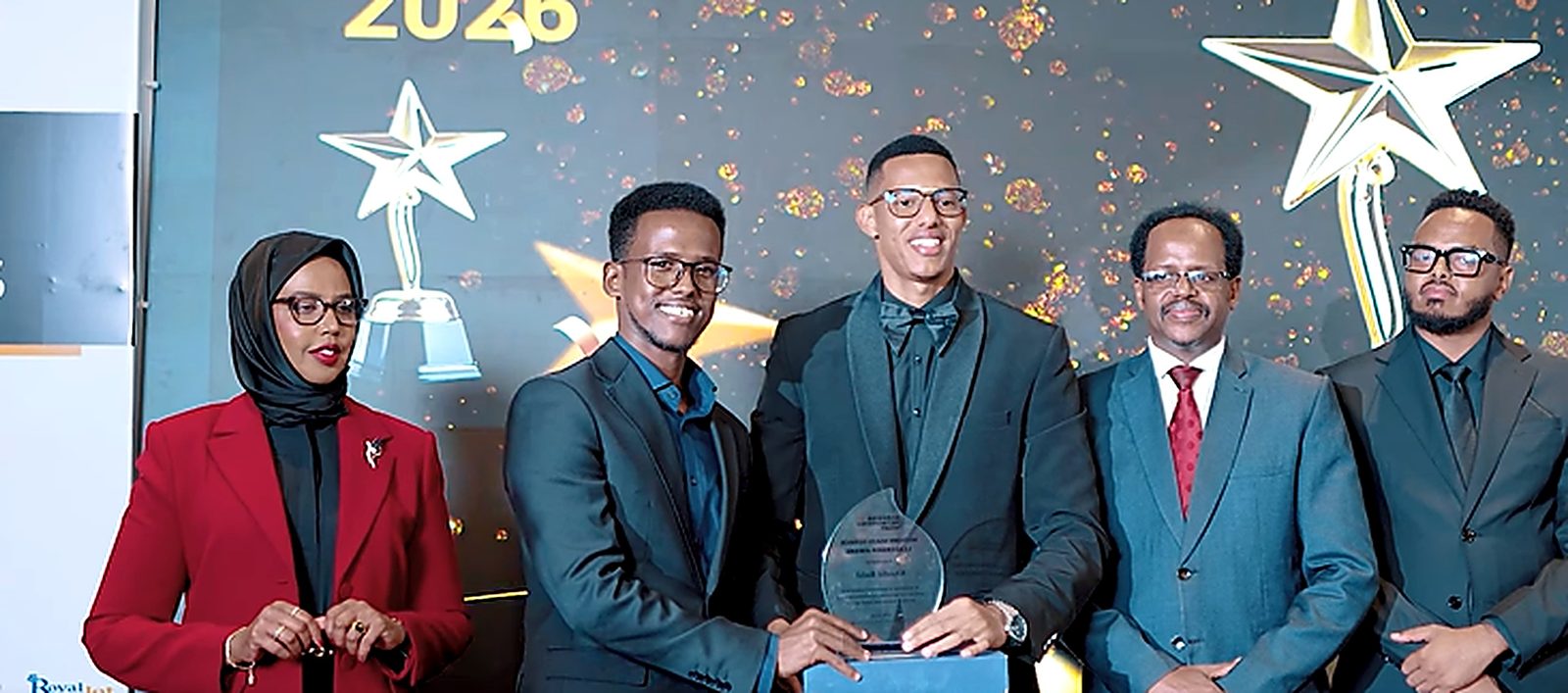 Khalid receiving the Best Young Man in Somaliland award on stage at Hargeisa Networking Night